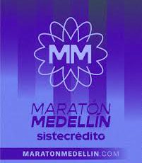 Afiche con el logo MM de la Maratón Medellín y el patrocinio de Sistecrédito (maratonmedellin.com)